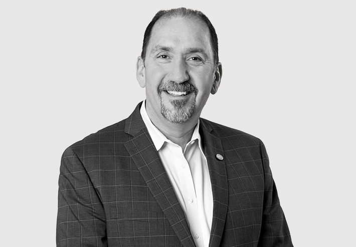 A headshot image of Kenneth A. Bouche