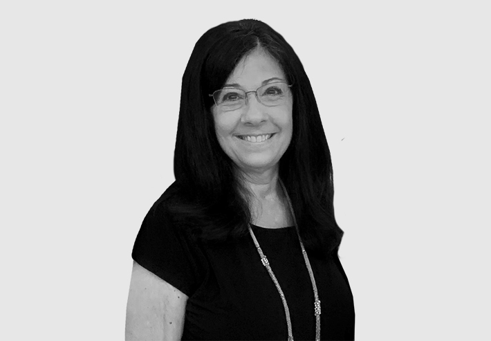 A headshot image of Sandra Ellis