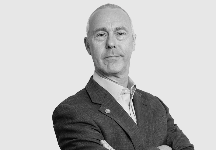 A headshot image of Gordon Garrard