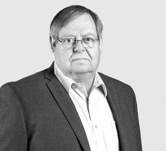 A headshot image of Dennis L. Jones