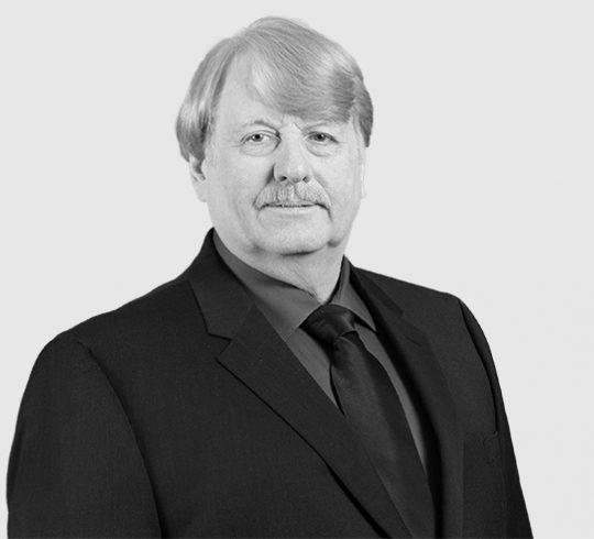 A headshot image of John A. Tesdall